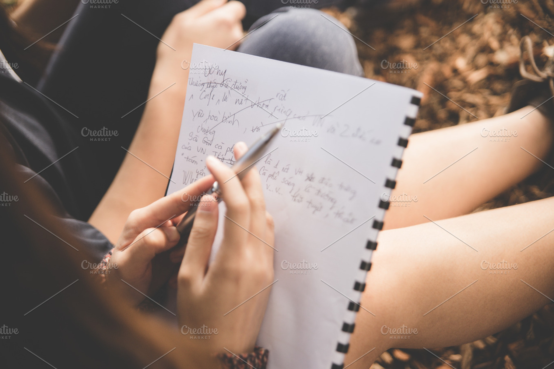 Asian girl brainstorming with paper
