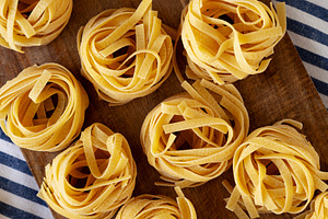 Raw Organic Dry Tagliatelle Pasta Ready to Cook, a Food & Drink Photo by LiudmylaChuhunova