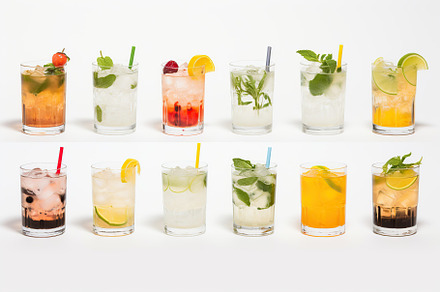 Different alcohol cocktails on white background, a Food & Drink Photo by AlyaAnd