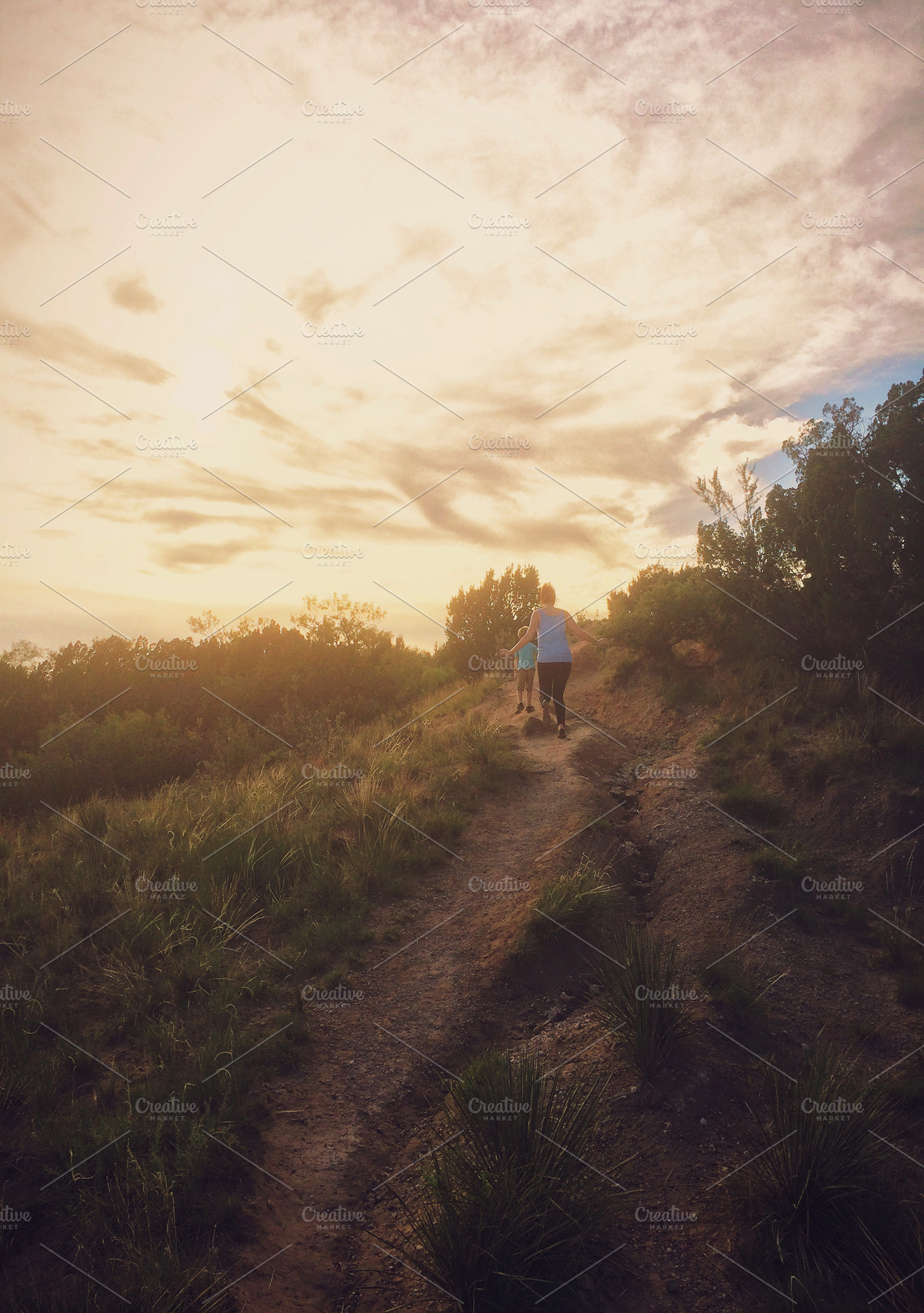 Walking Up A Path At Sunset