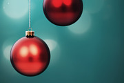 Christmas red and green matte ornaments on teal green background, a Photo by Dvoevnore photos (Thumbnail 1 of 2)