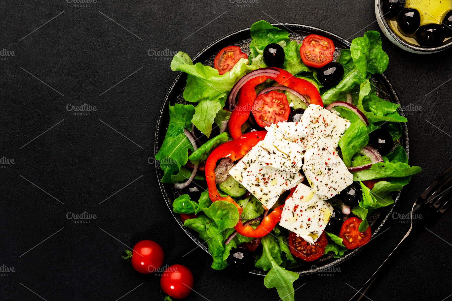 Greek salad with feta cheese, olives, cherry tomato, paprika, cu, a Food & Drink Photo by 5PH