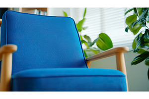 Blue cushioned armchair with wooden, an Architecture Photo by Lermont51