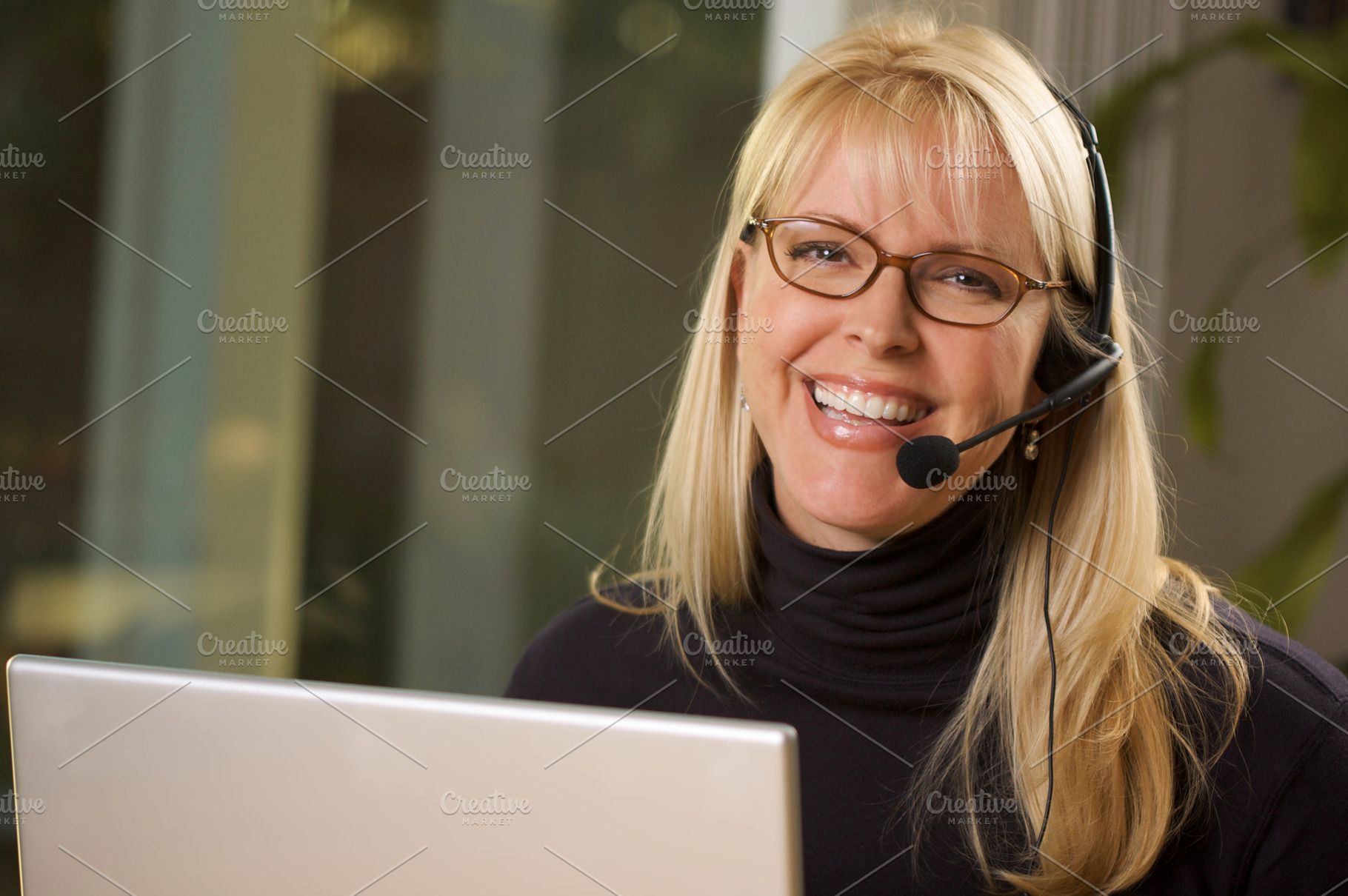 Attractive businesswoman with phone containing agent, assistant, and, a Person Photo by Andy Dean Photography