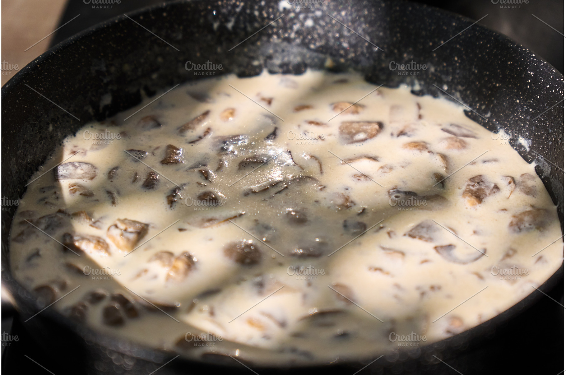 Creamy mushroom sauce simmering in a, a Food & Drink Photo by darksoul72