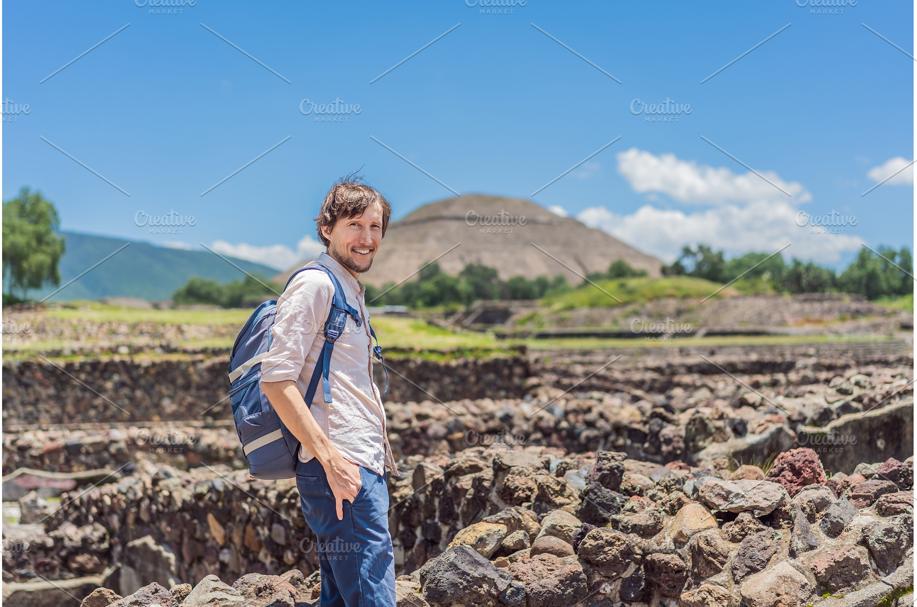 Male tourist posing in front of the, an Architecture Photo by Elizaveta Galitskaya