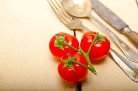 ripe cherry tomatoes over white wood, a Food & Drink Photo by keko64