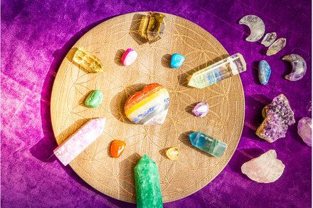 Healing crystals on brown background, a Health & Medical Photo by Neirfy