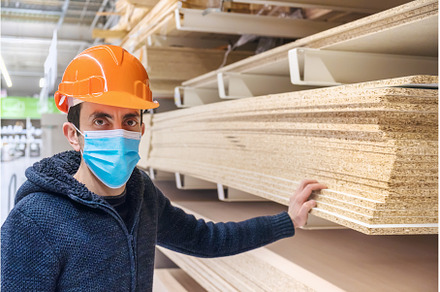 A man in a hardware store. Sells, a Person Photo by yanadjana