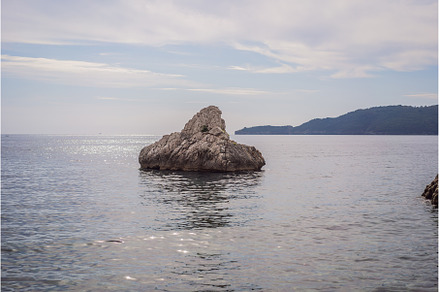 Beautiful rocks in the sea in, an Architecture Photo by Elizaveta Galitskaya