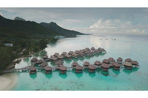 Moorea overwater bungalows creating, an Architecture Photo by Goinyk