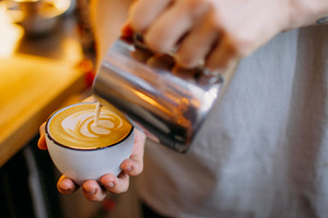 Cappuccino preparation hot beverage hand coffee, a Food & Drink Photo by Photo Drive Studio
