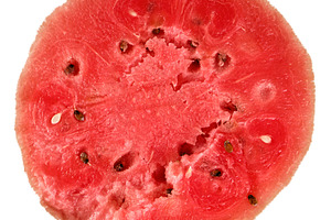 Juicy red watermelon slice with visible seeds, isolated on white, a Food & Drink Photo by ndanko