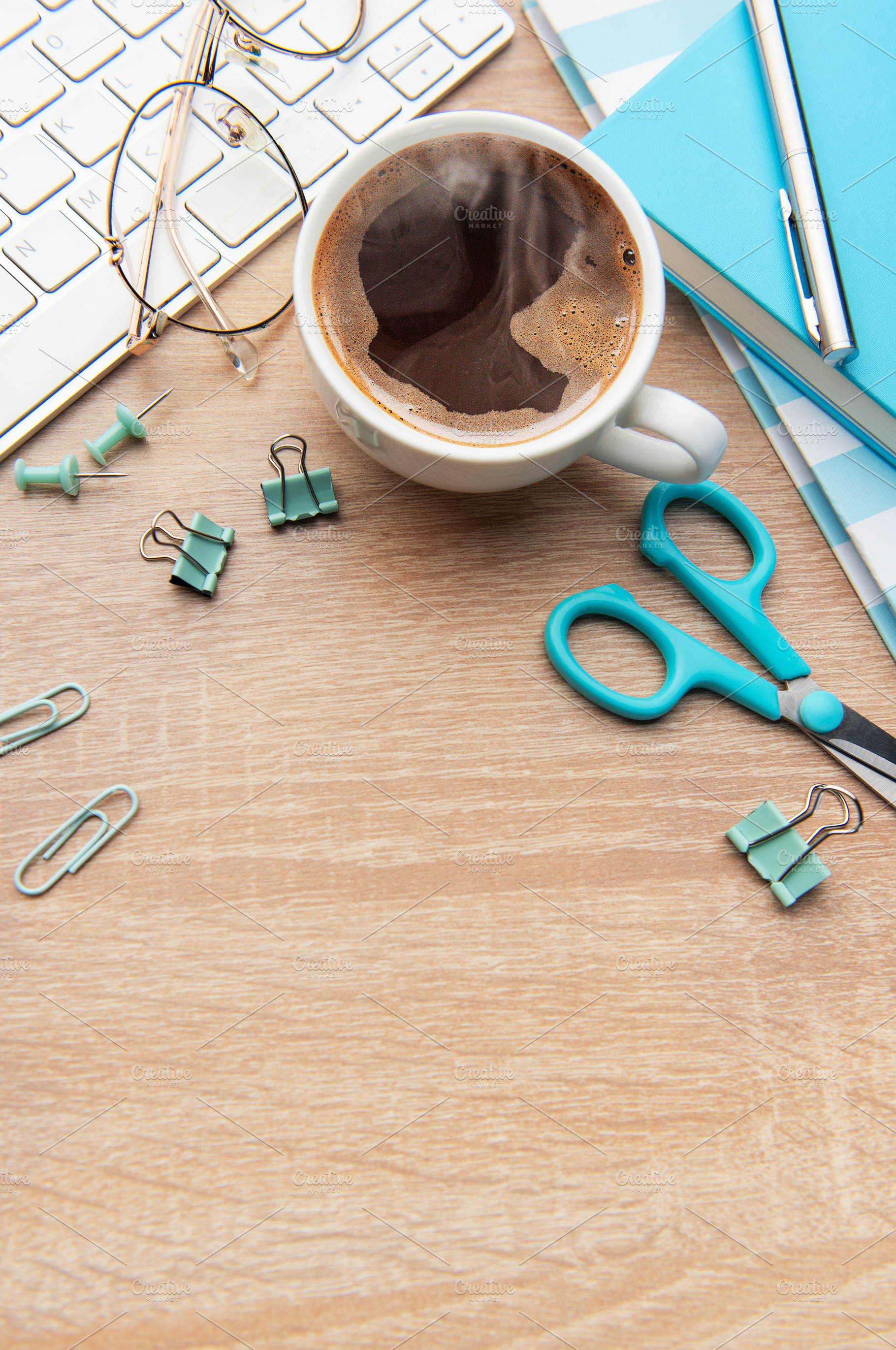 Overhead view of a modern desk with business essentials, a School & Education Photo by Olena Rudo