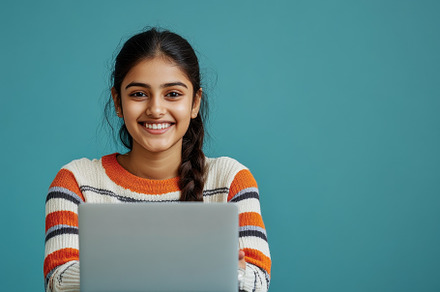 A happy student, an Indian teen girl, a Photo by Pavel_design