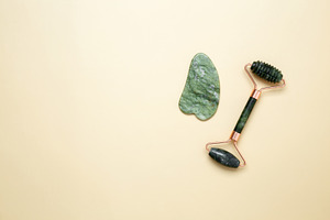 Marble facial roller, gua sha for skincare and relaxation, a Photo by matucha