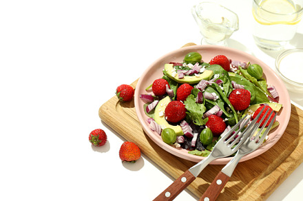 Concept of tasty salad, salad with strawberry, space for text, a Food & Drink Photo by AtlasStudio