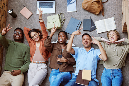 University floor, diversity portrait and students coworking on group research project, college study or education learning. Knowledge, teamwork and top view of happy exited friends on school campus, a Photo by Peopleimages.com