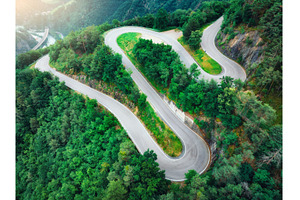 Aerial view of mountain curvy road, a Transportation Photo by den-belitsky