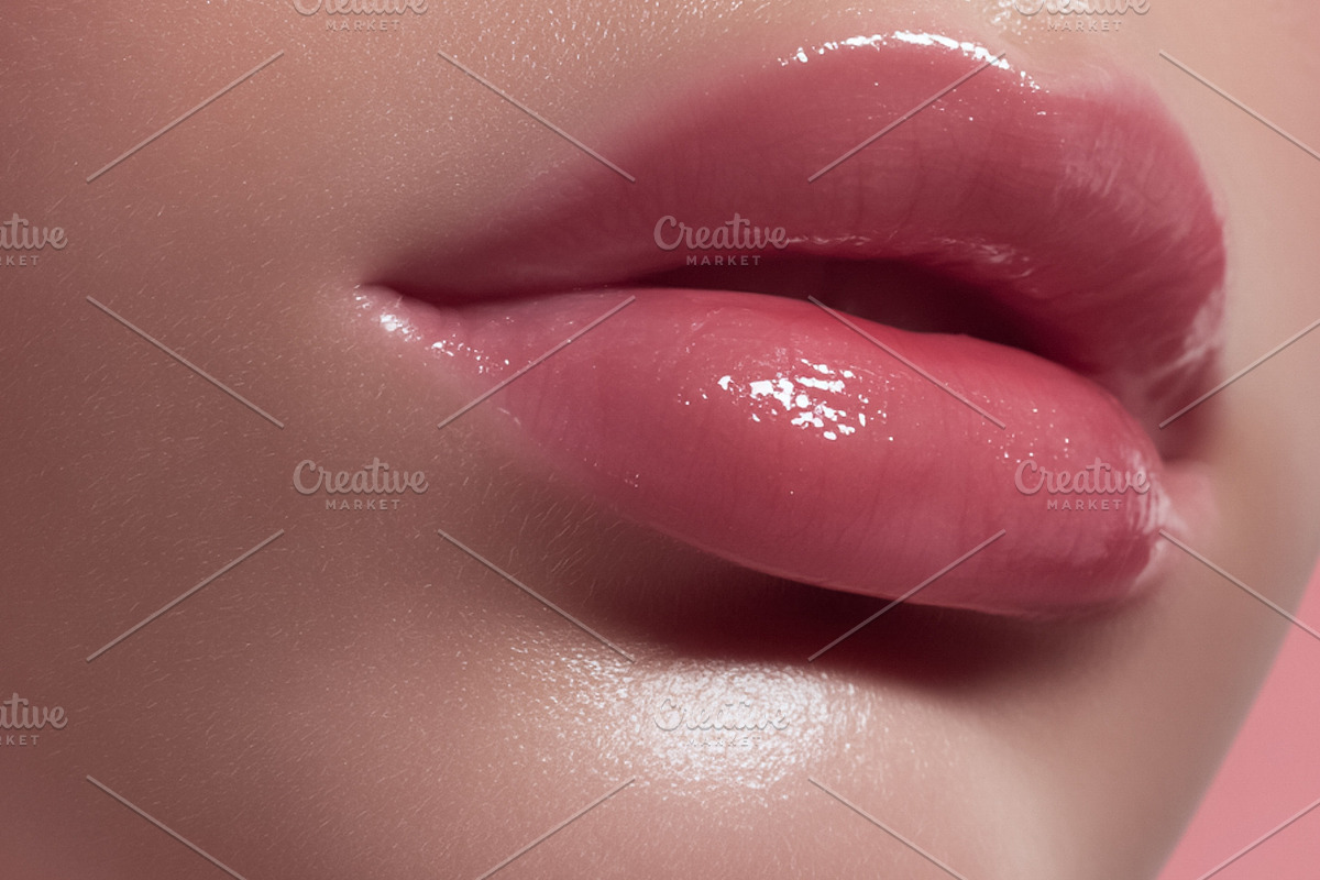 Woman's glossy pink lips and glowing skin close up, showcasing b, a Beauty & Fashion Photo by Studio ANNA (Photo 1 of 2)