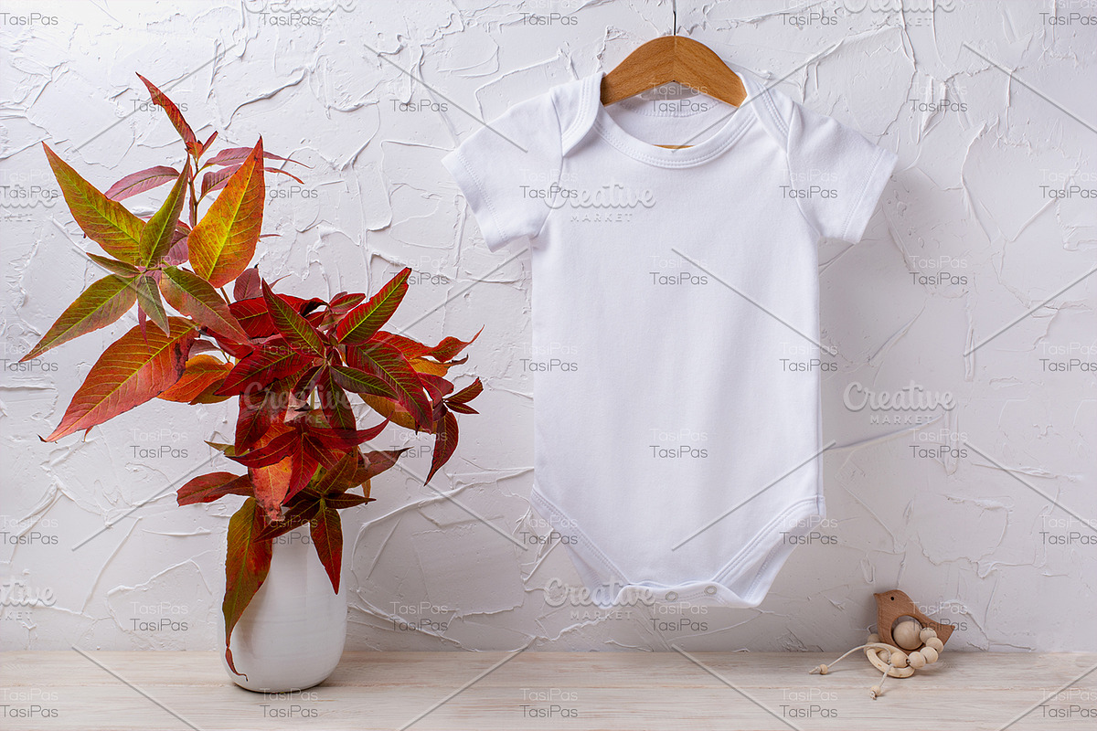 Baby bodysuit mockup with red grass, a Shirt Mockup by TasiPas (Photo 3 of 4)
