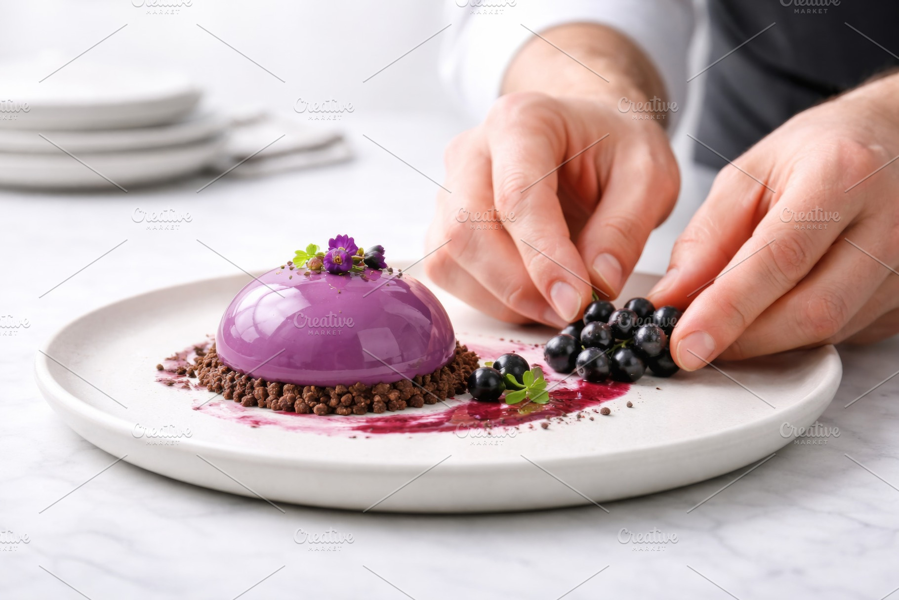 Black currant dessert garnished with, a Photo by Dvoevnore photos