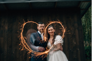 Bride and groom with sparklers, a Person Photo by HalfPoint