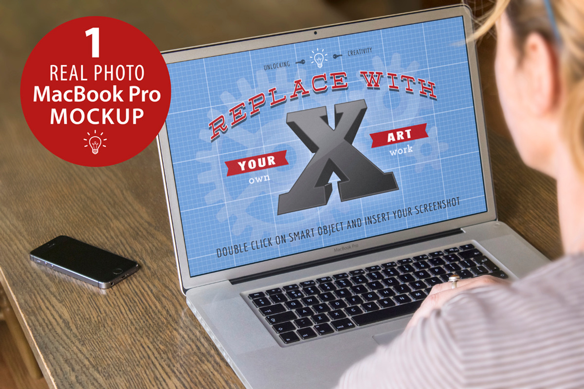 MacBook Pro Mockup, an iPhone Mockup by Fresh Design Elements (Photo 1 of 2)