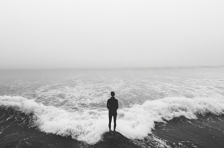 Contemplative figure gazes upon the, a Background Photo by Pixeness