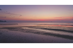 Beautiful sunset over serene tidal, a Nature Photo by Goinyk