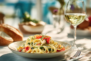 Lunch with pasta and white wine, a Photo by Beautiful things