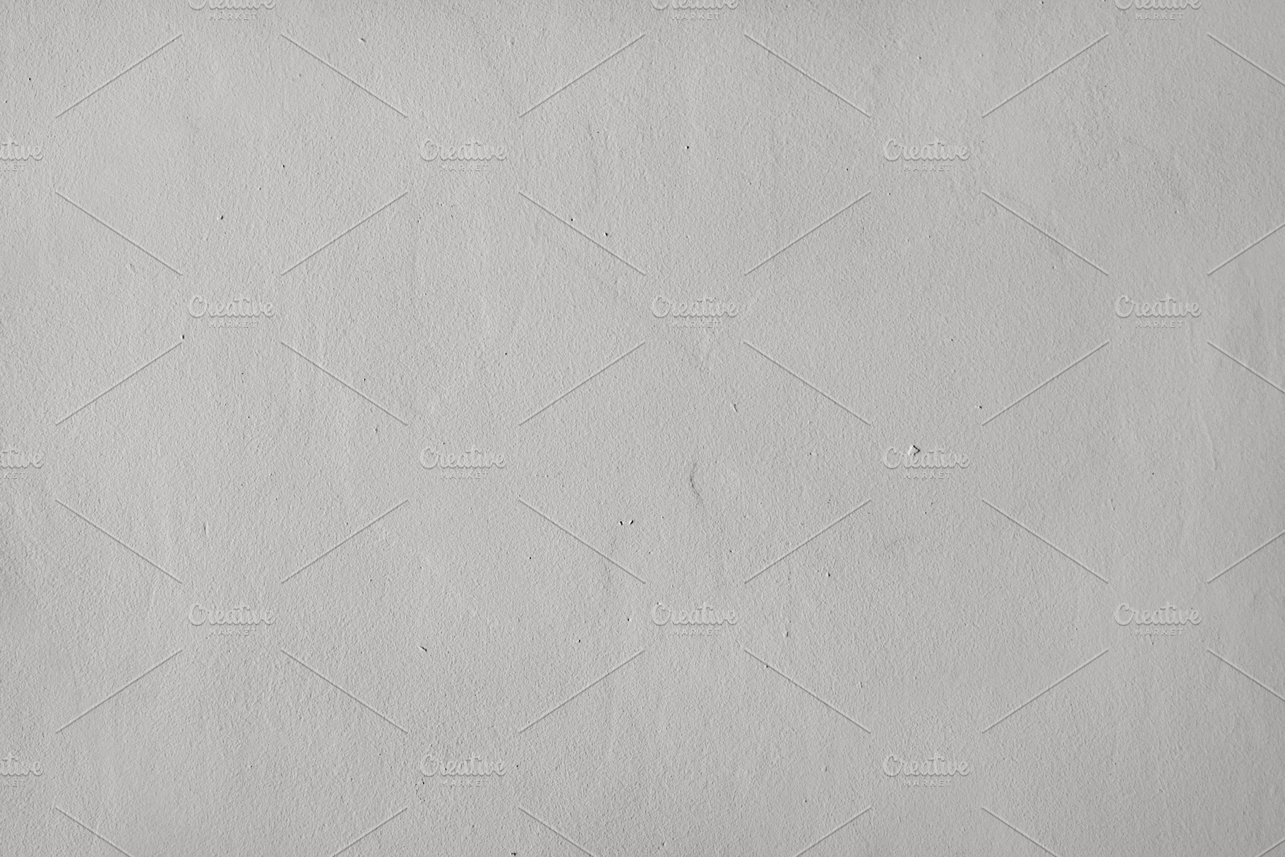 Detail of a smooth irregular stuccoed wall with grey imperfectio, an Abstract Photo by Davizro's Market