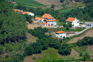 Small mountain village with terracotta rooftops, a Nature Photo by DanFLCreativo