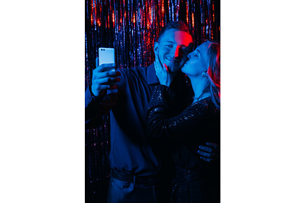 christmas selfie gadget people neon, a Person Photo by Photo Drive Studio