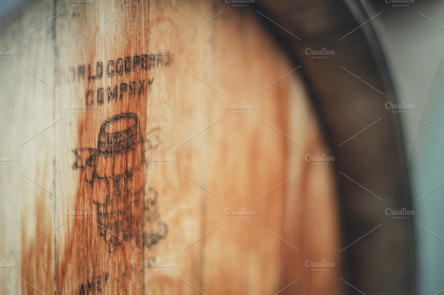 Wine barrel featuring wine, barrel, and wood