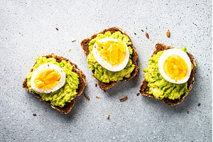 Whole grain bread with avocado and, a Food & Drink Photo by Nadia-nb