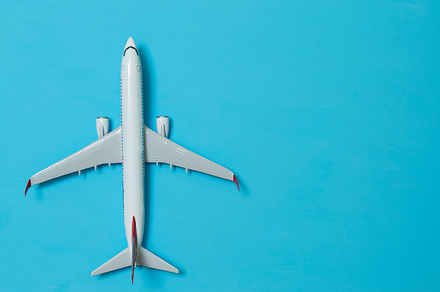 white airplane on a blue