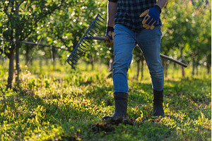 Farmer workingn in the middle of his, a Person Photo by HalfPoint