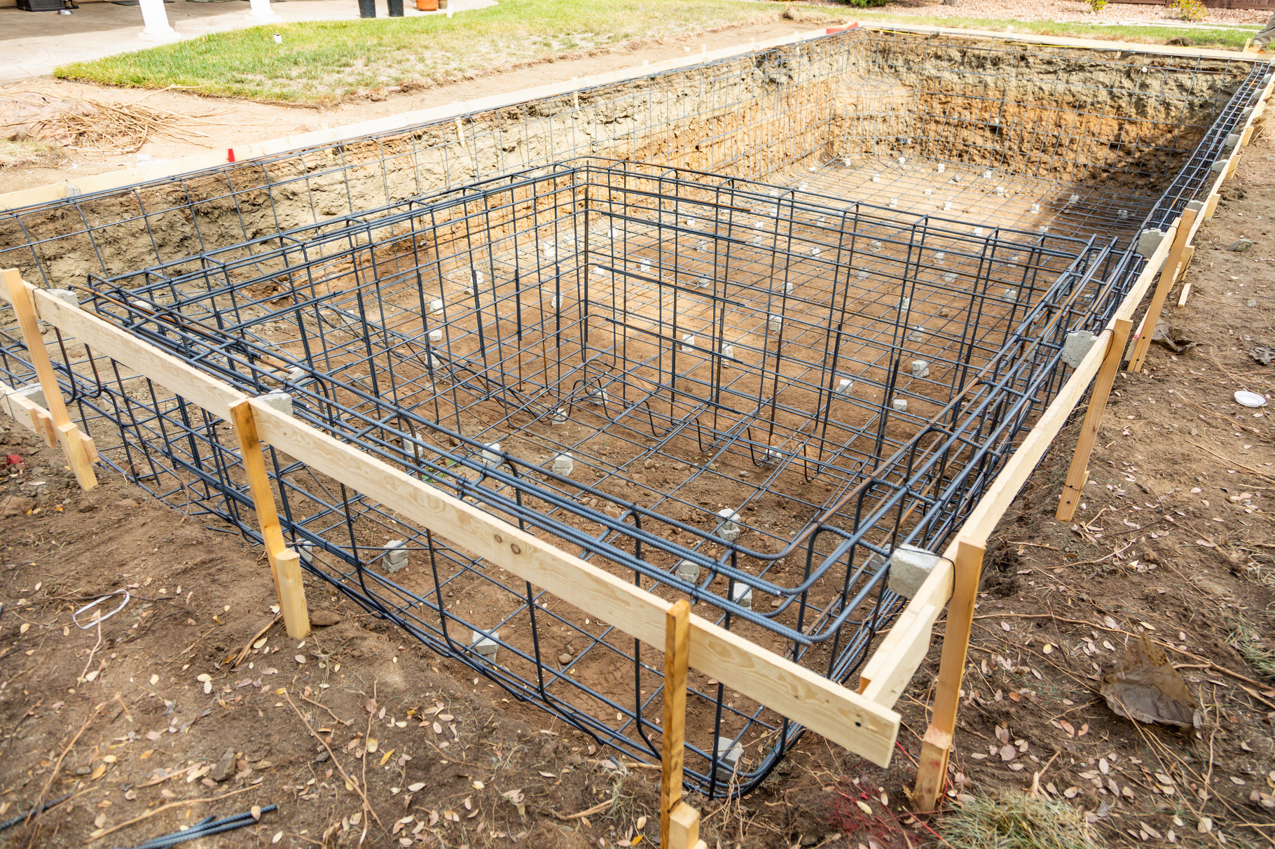 New swimming pool rebar framing featuring rebar, steel, and