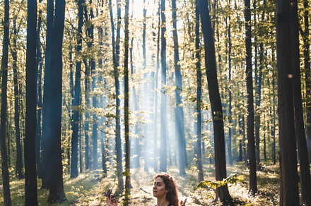 Girl go in for sports in the forest.