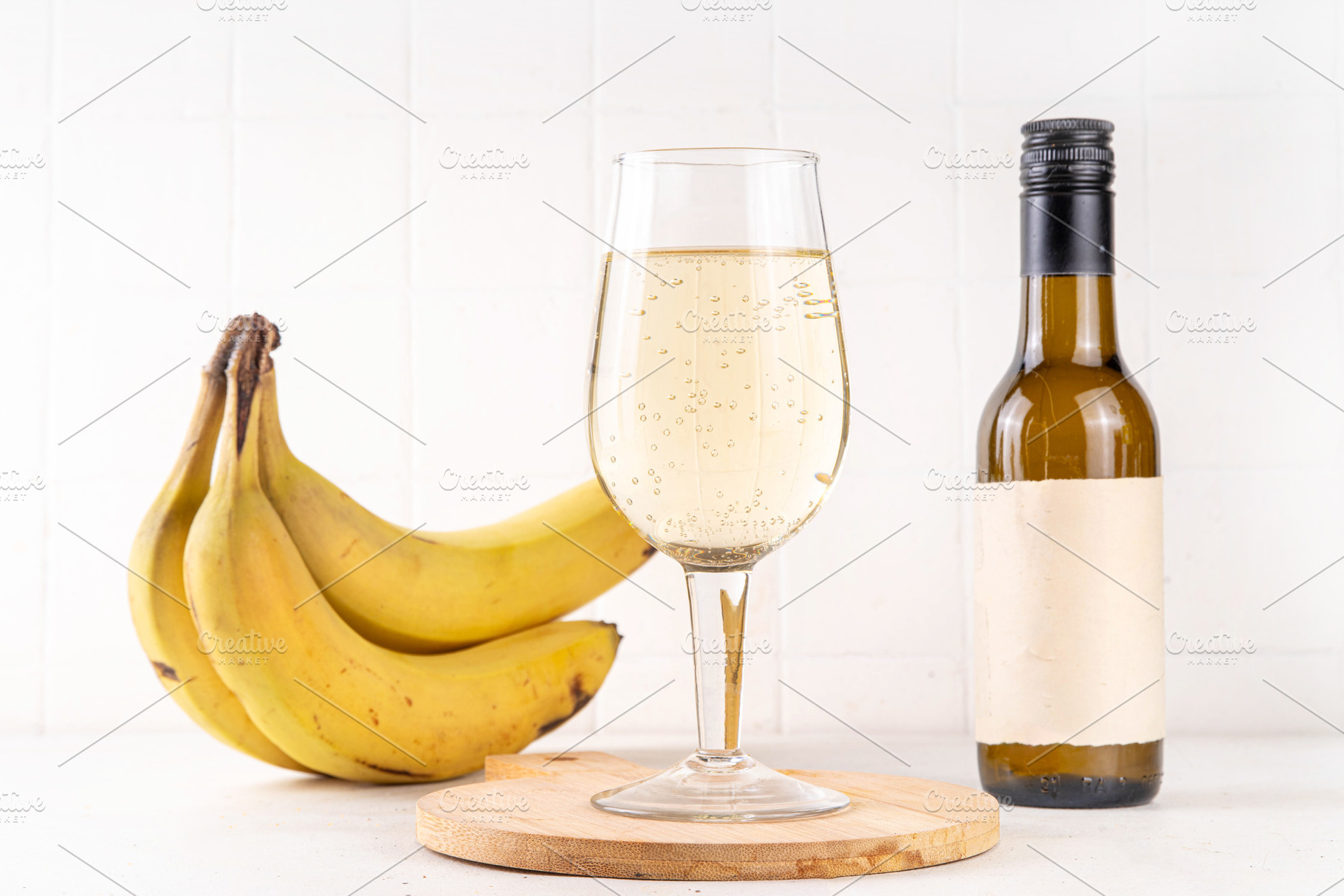 Delicious fermented banana wine craft alcohol drink, a Food & Drink Photo by Rimma