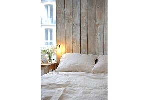 Cozy rustic bedroom with wooden wall, an Arts & Entertainment Photo by Lermont51