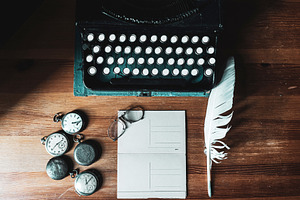 vintage desk with typewriter, an Arts & Entertainment Photo by VetalStock