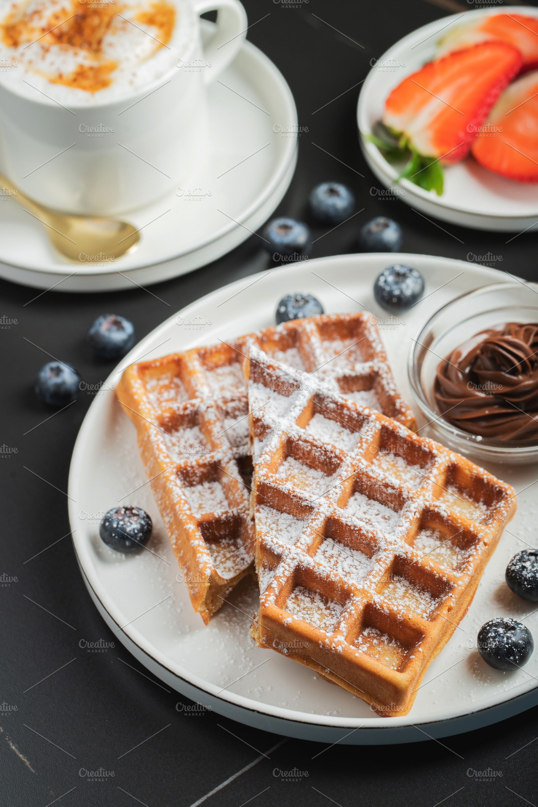 Belgium waffles Homemade waffles with strawberries, a Food & Drink Photo by Budarinphoto