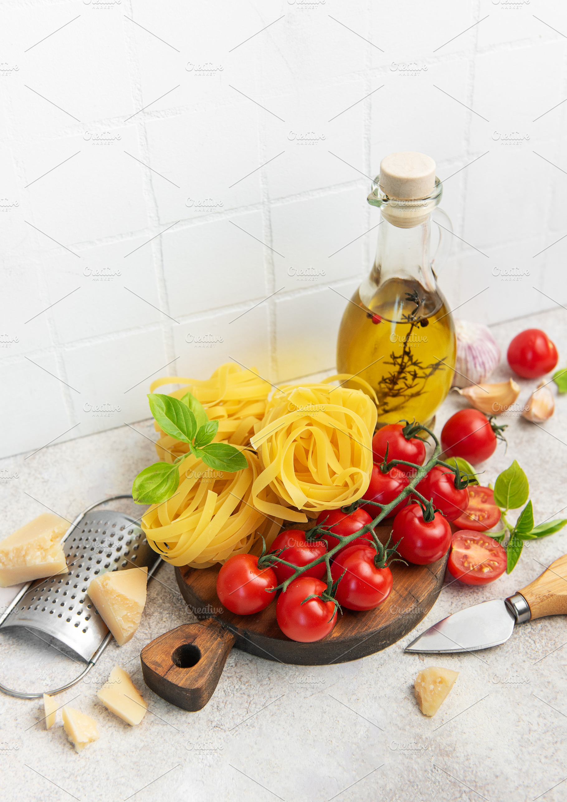 Italian pasta ingredients preparing a fresh meal, a Food & Drink Photo by Olena Rudo