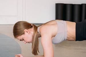 Female exercise core strength training plank gym, a Person Photo by Photo Drive Studio