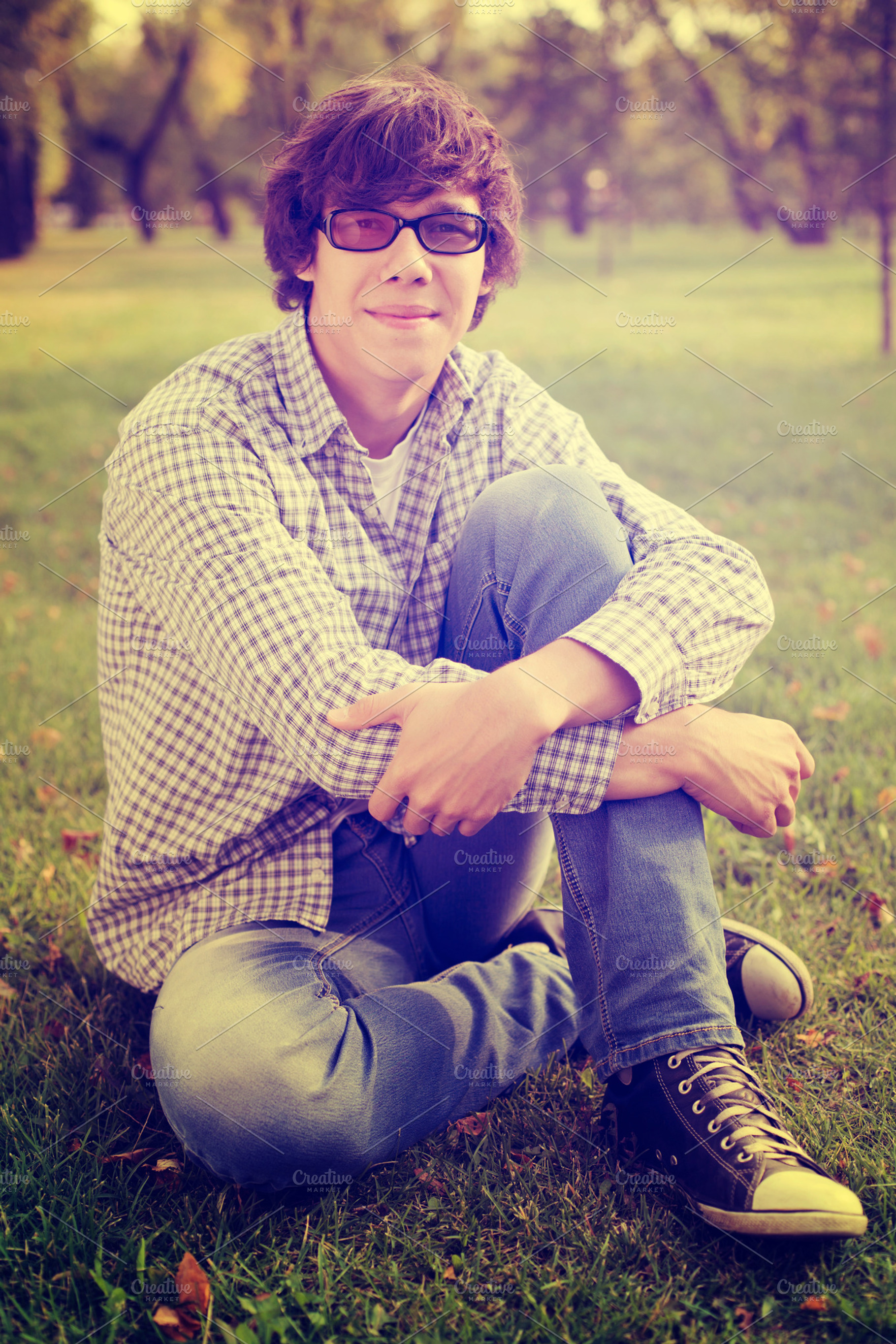Student sitting on grass