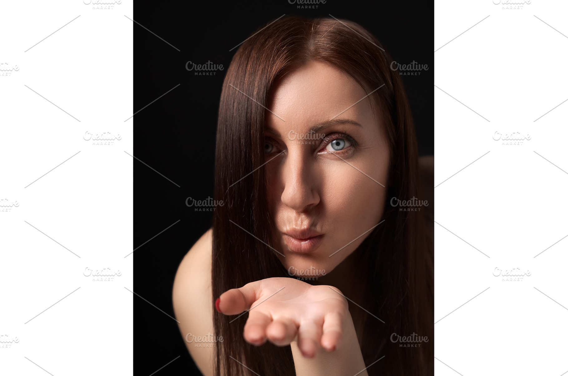 Woman blowing lips send air kisses, a Person Photo by Alexander-Piragis