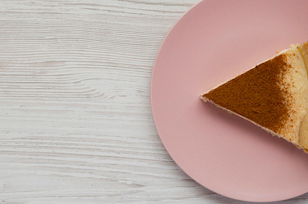 Homemade Sugar Cream Pie on a pink plate on a white wooden surfa, a Food & Drink Photo by LiudmylaChuhunova