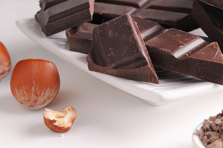 Chocolate with hazelnuts close up, a Food & Drink Photo by Davizro's Market